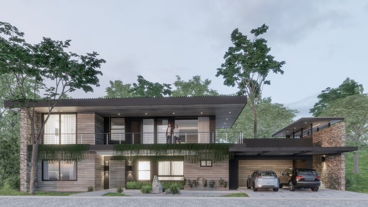 Modern two-story house with a flat roof, wooden and stone exterior, large windows, and a driveway with two cars. Two people are standing on the balcony, surrounded by trees and greenery.