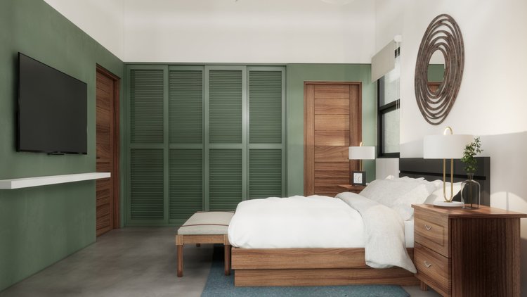Modern bedroom with green accent wall, wooden furniture, a wall-mounted TV, and decor including a circular mirror.