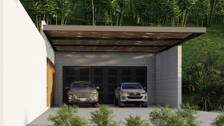 Modern house with a garage housing two cars, surrounded by lush greenery and trees.