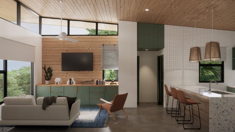 Open-concept living room and kitchen with wood accents, large windows, a beige sofa, wooden armchair, TV, green cabinets, pendant lights, and a marble kitchen island with bar stools.
