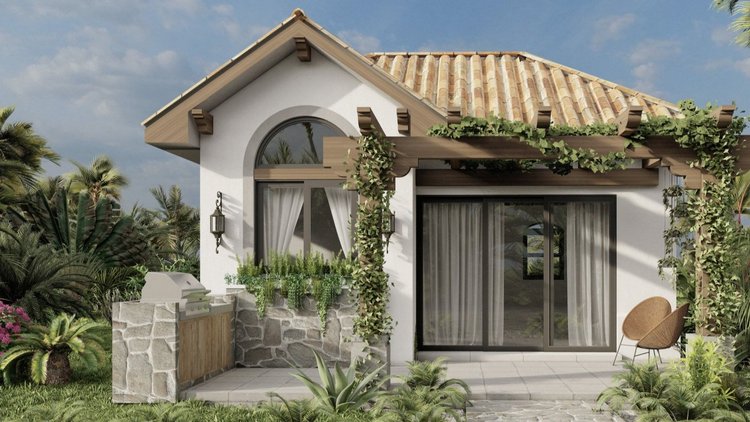A modern house with a stone and white exterior, featuring large windows with curtains, a small outdoor patio with two chairs, a built-in outdoor grill, and lush green plants surrounding it under a partly cloudy sky.