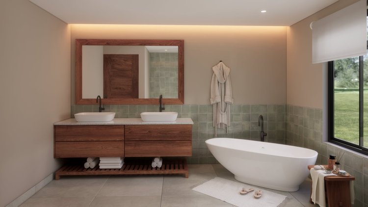 Modern bathroom with a white freestanding bathtub by a large window, dual vessel sinks with black faucets on a wooden vanity, mirror, wall-mounted towel robe, and green tiled accents.