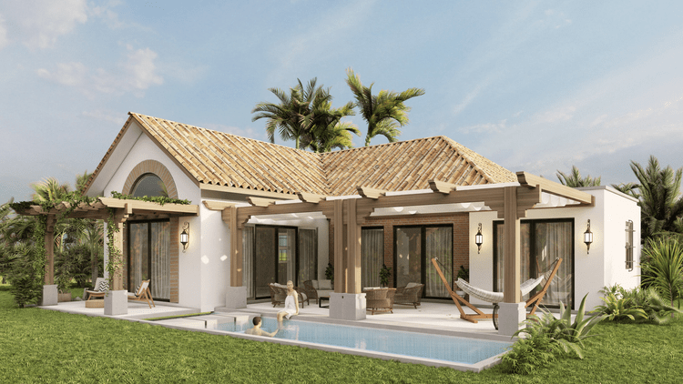 Beautiful modern house with a tiled roof, outdoor seating, hammock, swimming pool, and lush green landscaping under a blue sky with palm trees in the background.